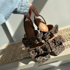 BUTTERFLY HEEL LEP.