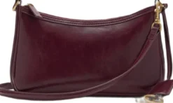 Crossbody bag with charms and rings