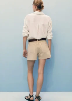 Denim shorts with frayed hem
