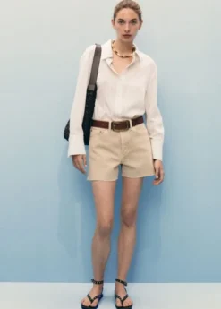 Denim shorts with frayed hem