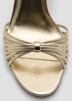 Heeled sandals with straps