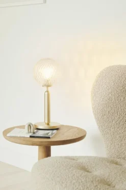 Miira Table, brass / optic clear