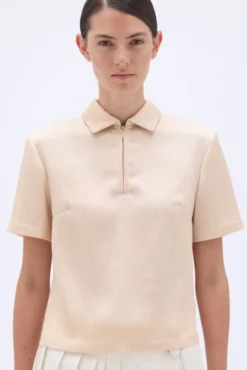ZIPPED POLO TOP